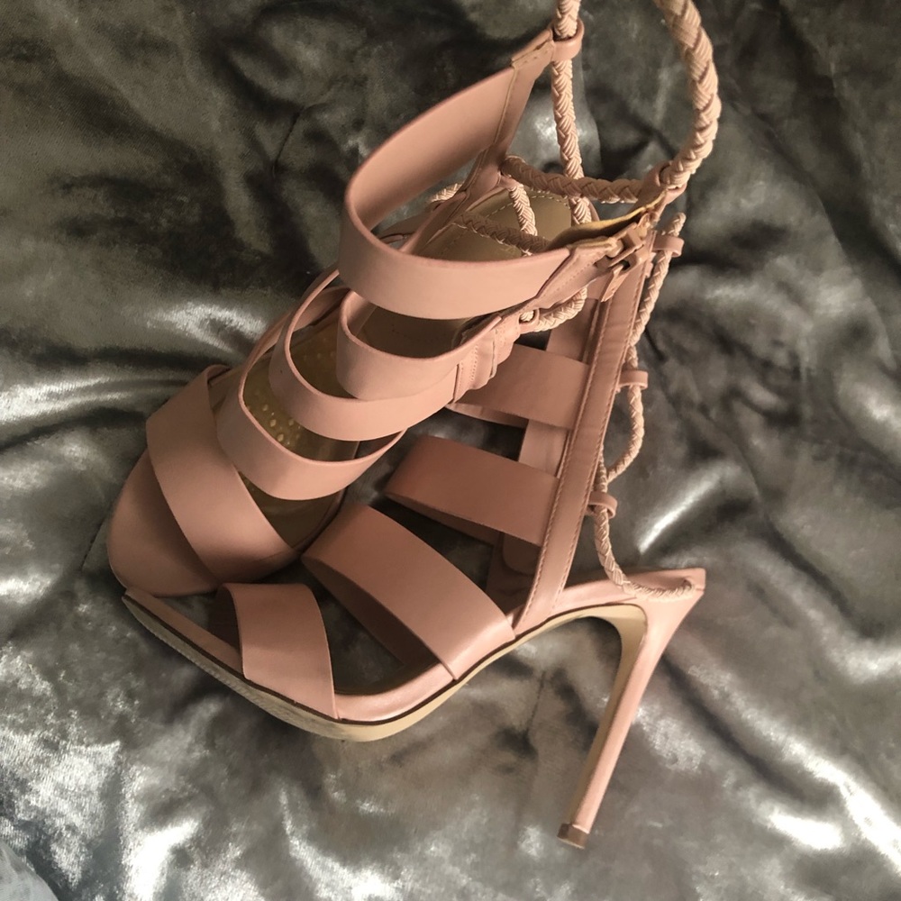 Aldo light pink zip up ankle heels.